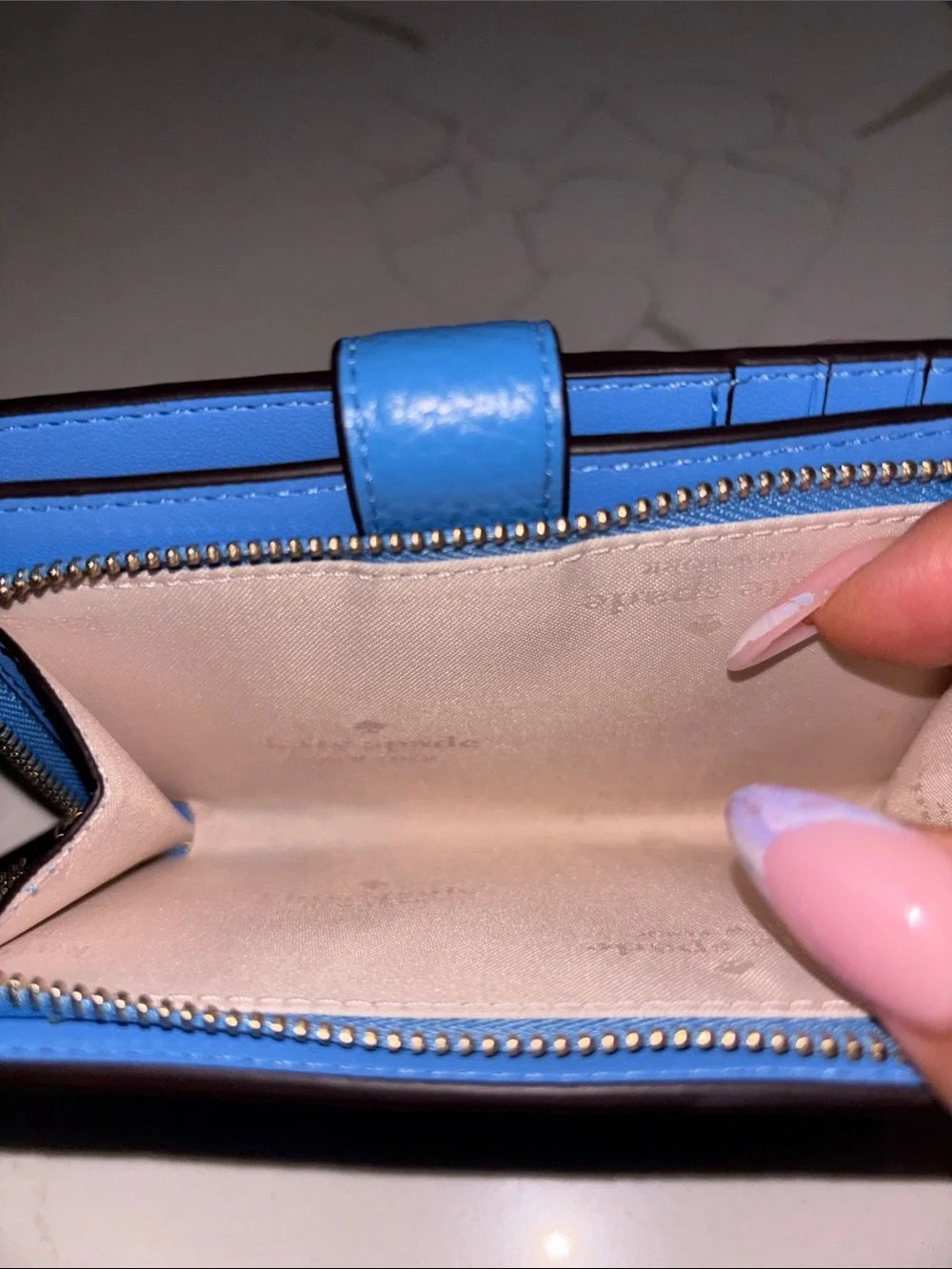 kate spade pebble leather zip wallet in bright blue
